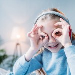 Little girl in headphones