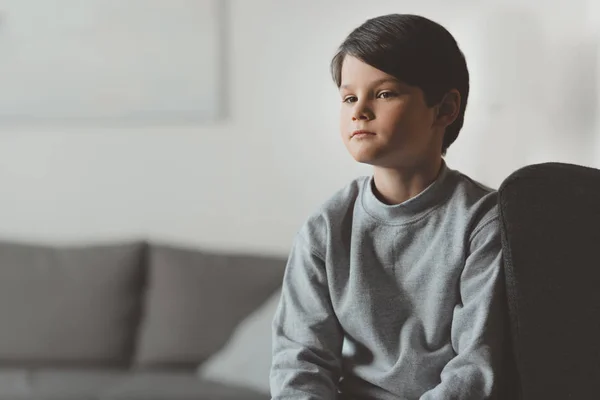 Pensive little kid boy at home — Stock Photo, Image