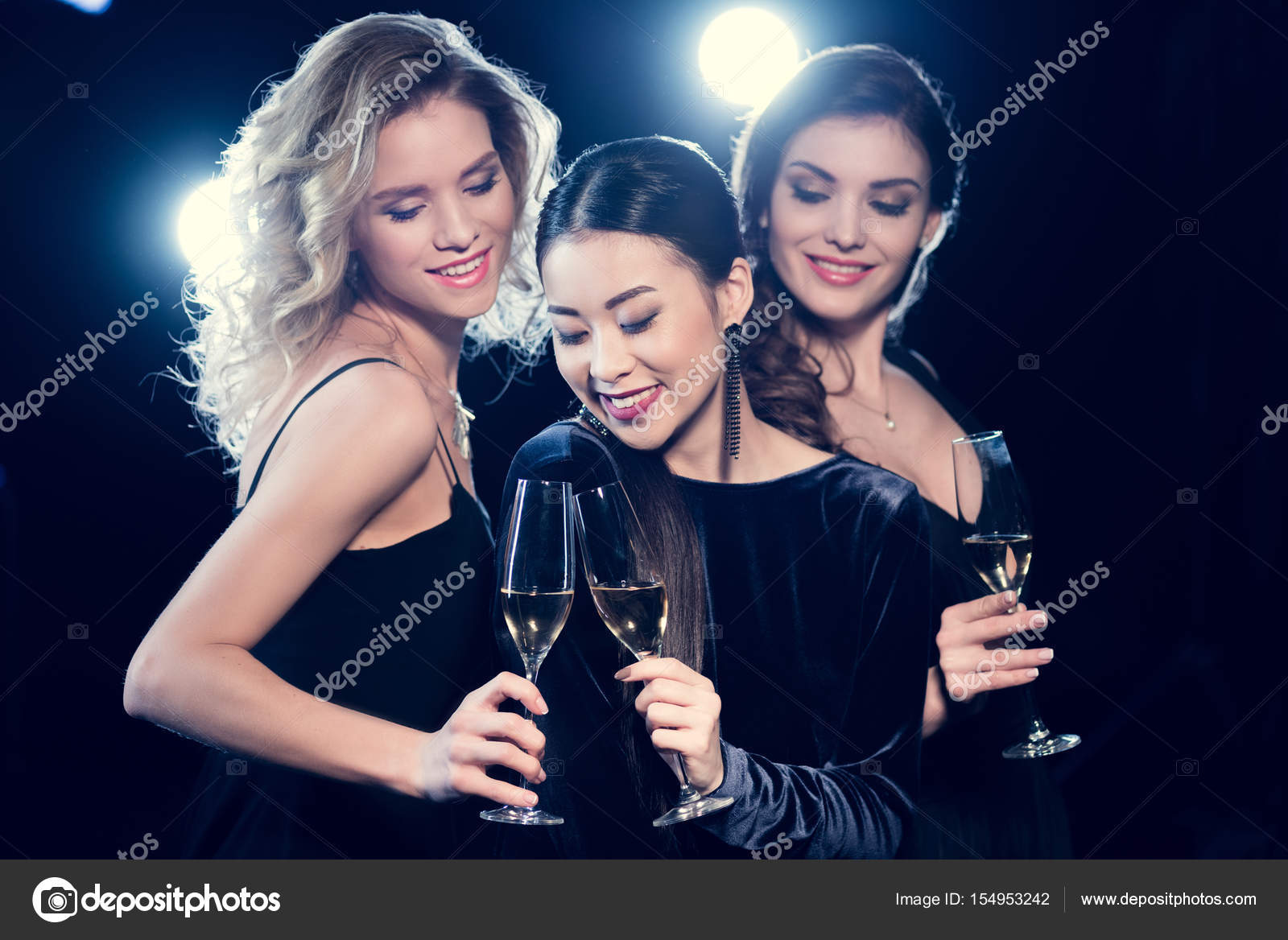 Young women drinking champagne ??? Stock Photo ?? TarasMalyarevich 154953242