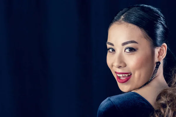 Glamorous asian woman looking at camera — Stock Photo, Image