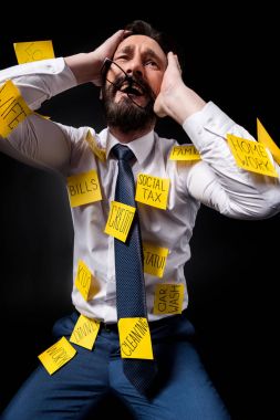 stressed businessman with sticky notes  clipart