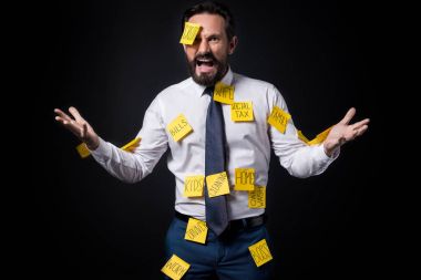 stressed businessman with sticky notes clipart