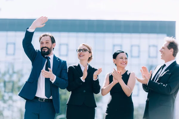 Multiethnic businesspeople applauding — Stock Photo, Image