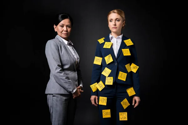 Stressed businesswoman with colleague — Stock Photo, Image