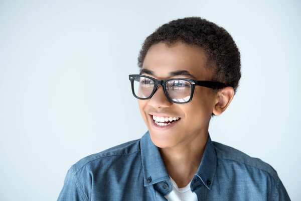 african american teenage boy in eyeglasses
