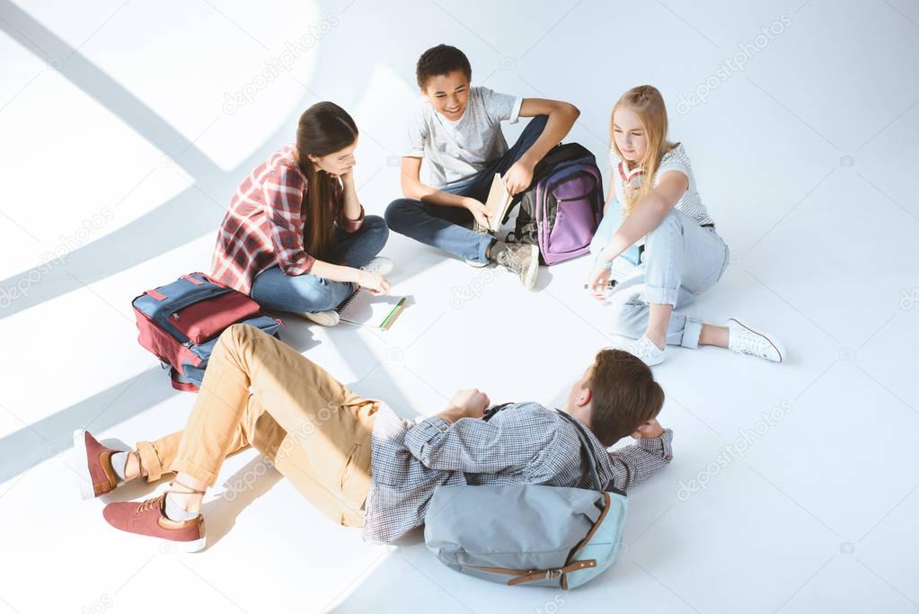 multicultural students resting after classes