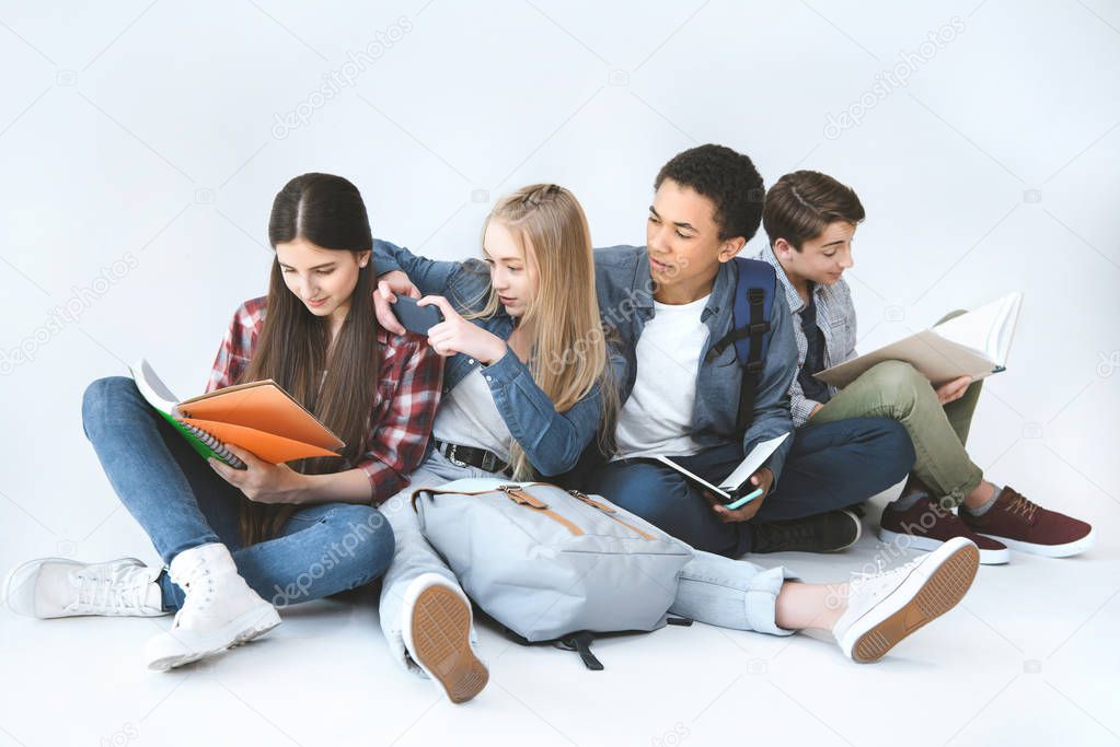 multicultural students doing homework