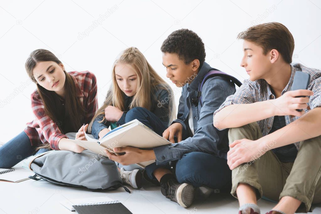 multiethnic students doing homework