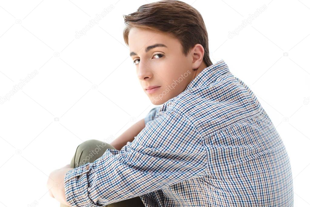 pensive caucasian teenage boy