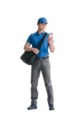 young asian courier with smartphone clipart