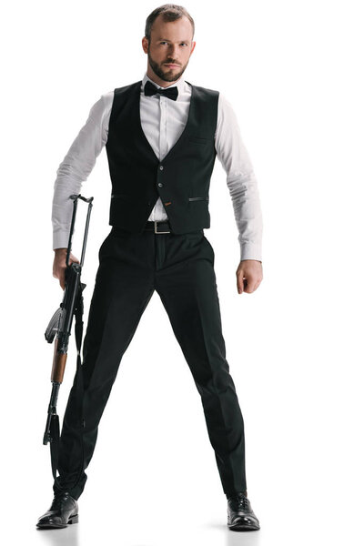 secret agent in suit with rifle