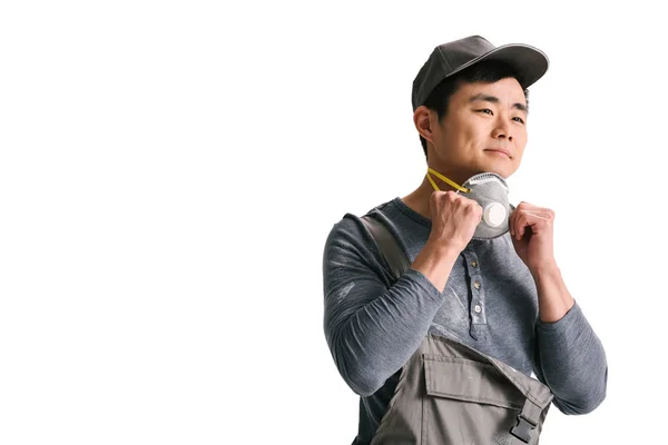 Asian construction worker with respirator — Free Stock Photo