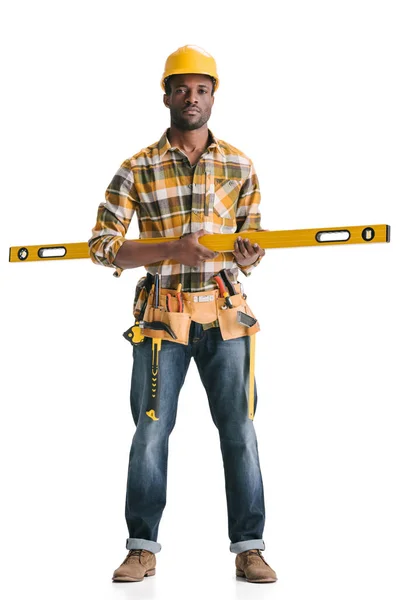 Trabalhador da construção com ferramenta de nivelamento — Fotografia de Stock
