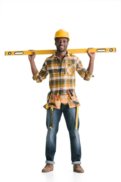 Travailleur de la construction avec outil de nivellement — Photo