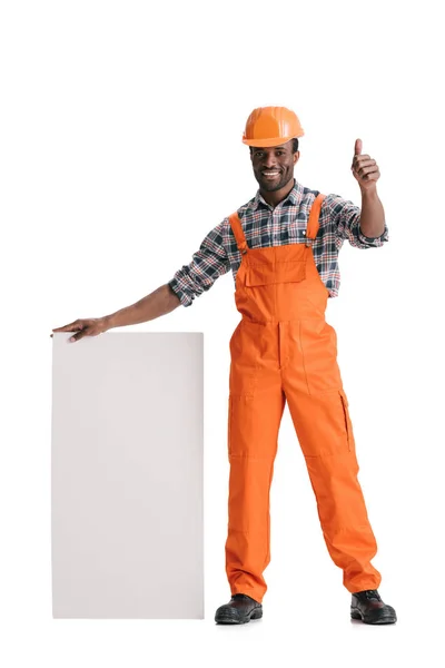 Builder with blank white banner — Stock Photo, Image