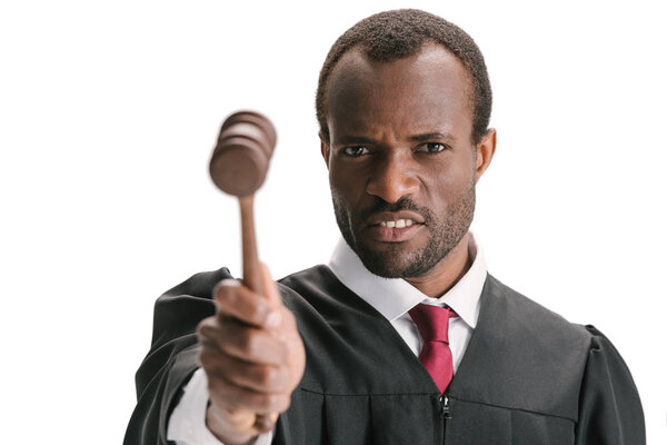 judge pointing at camera with gavel