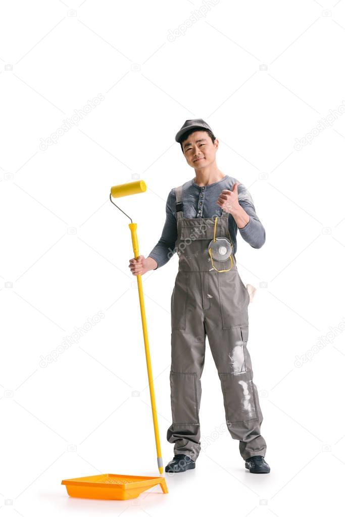 construction worker with roller brush