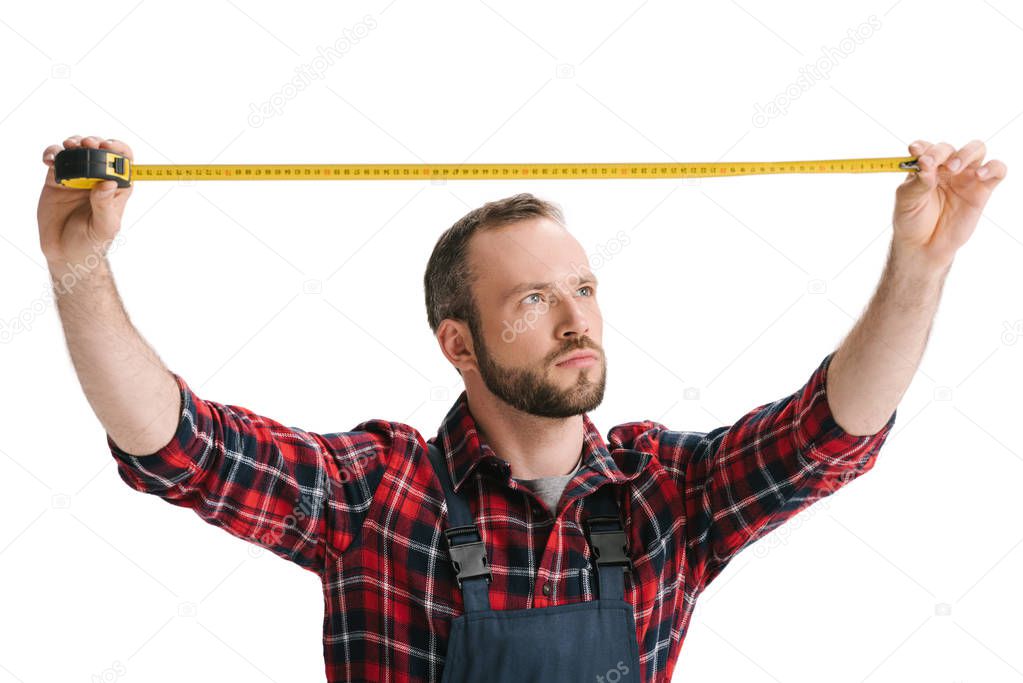 construction worker with measuring tape