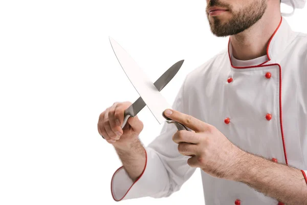 Jonge chef-kok slijpen van messen — Stockfoto