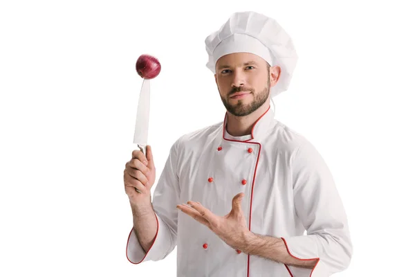 Chef with onion on knife — Stock Photo, Image
