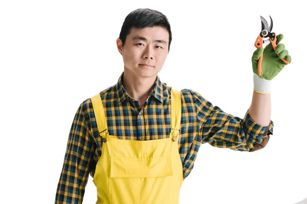 Handsome asian gardener with secateurs — Stock Photo, Image