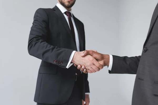 Multicultural businessmen handshake — Stock Photo, Image