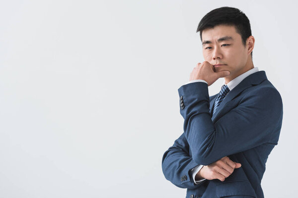 pensive asian businessman 
