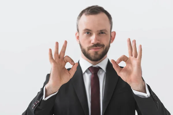 Businessman showing ok sign — Stock Photo, Image