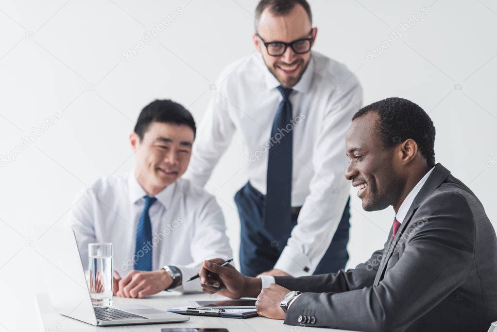 multiethnic businessmen having discussion