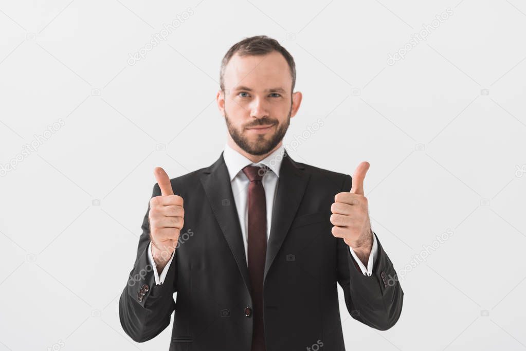 businessman showing thumbs up