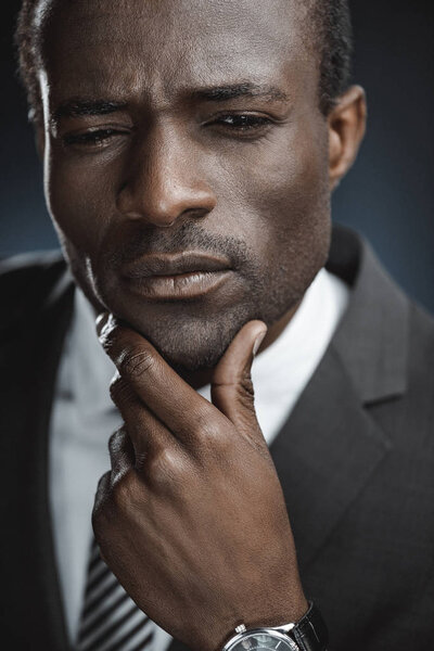 pensive african american businessman