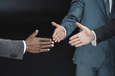 çok ırklı işadamları eller outstretching