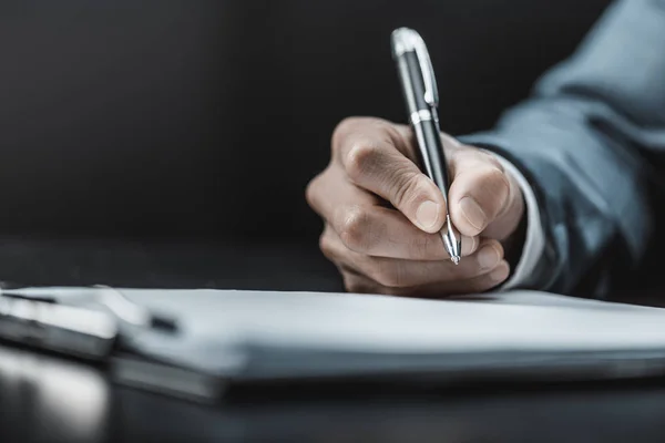 Businessman doing paperwork Stock Photo