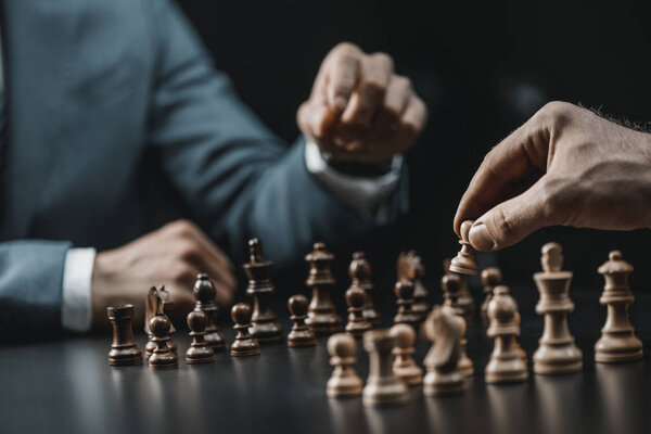 businessmen playing chess