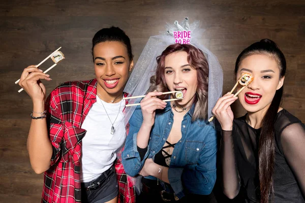 Multicultural women with sushi at hen party — Stock Photo, Image