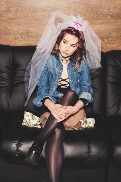 Fiance sitting on sofa — Stock Photo, Image