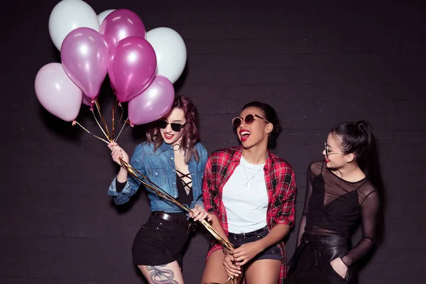 Multicultural women with balloons — Stock Photo, Image