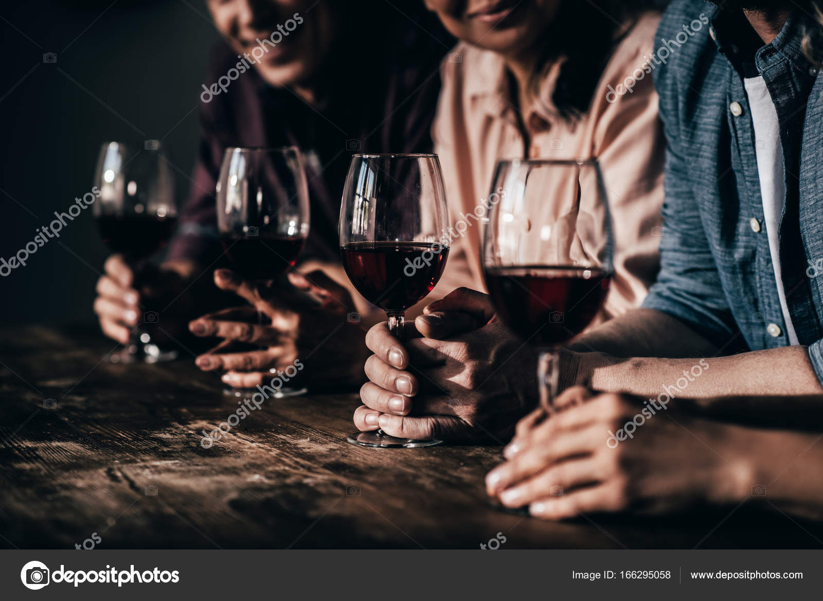 depositphotos_166295058-stock-photo-friends-drinking-red-wine.jpg