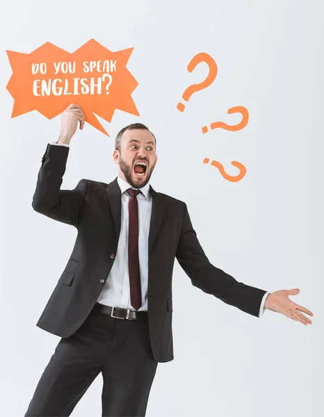 Businessman with card with question Stock Image