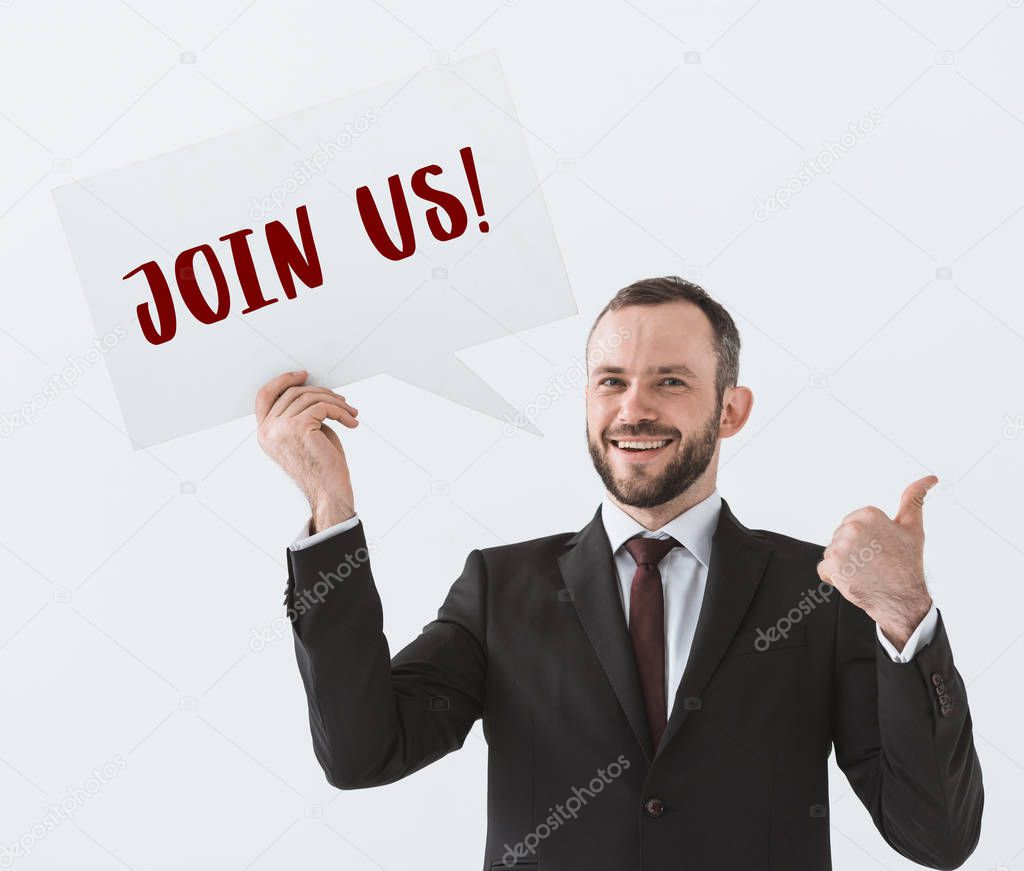 businessman showing join us card