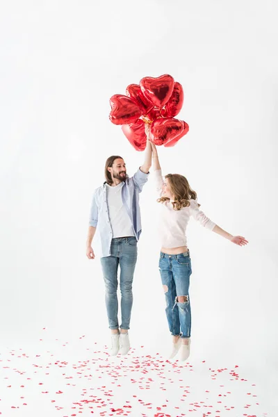 Pareja con globos de aire - foto de stock