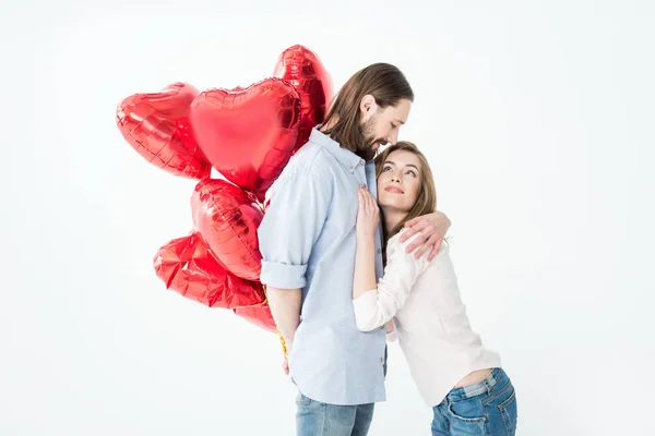 Pareja con globos de aire - foto de stock