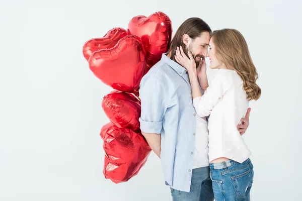 Pareja con globos de aire - foto de stock