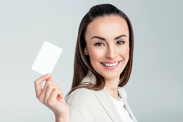 Woman holding credit card — Stock Photo