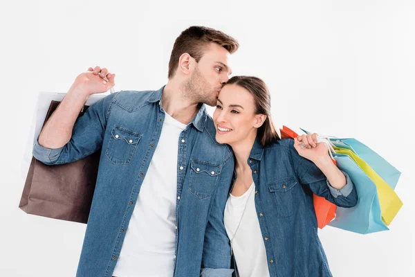 Pareja con bolsas de compras - foto de stock