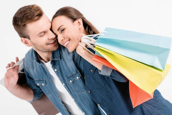 Coppia con borse shopping — Foto stock