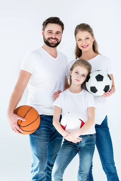 Família com bolas de esportes — Fotografia de Stock