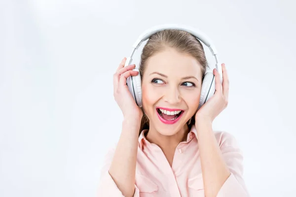 Woman listening music with headphones — Stock Photo