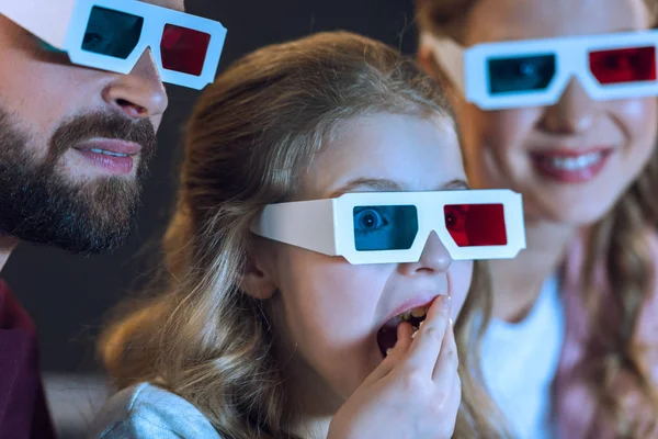 Family watching movie — Stock Photo