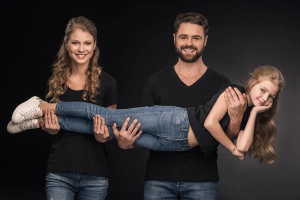 Happy parents and daughter — Stock Photo